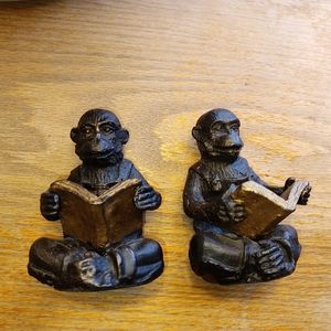 Pair of bronze Darwin monkey reading a book
